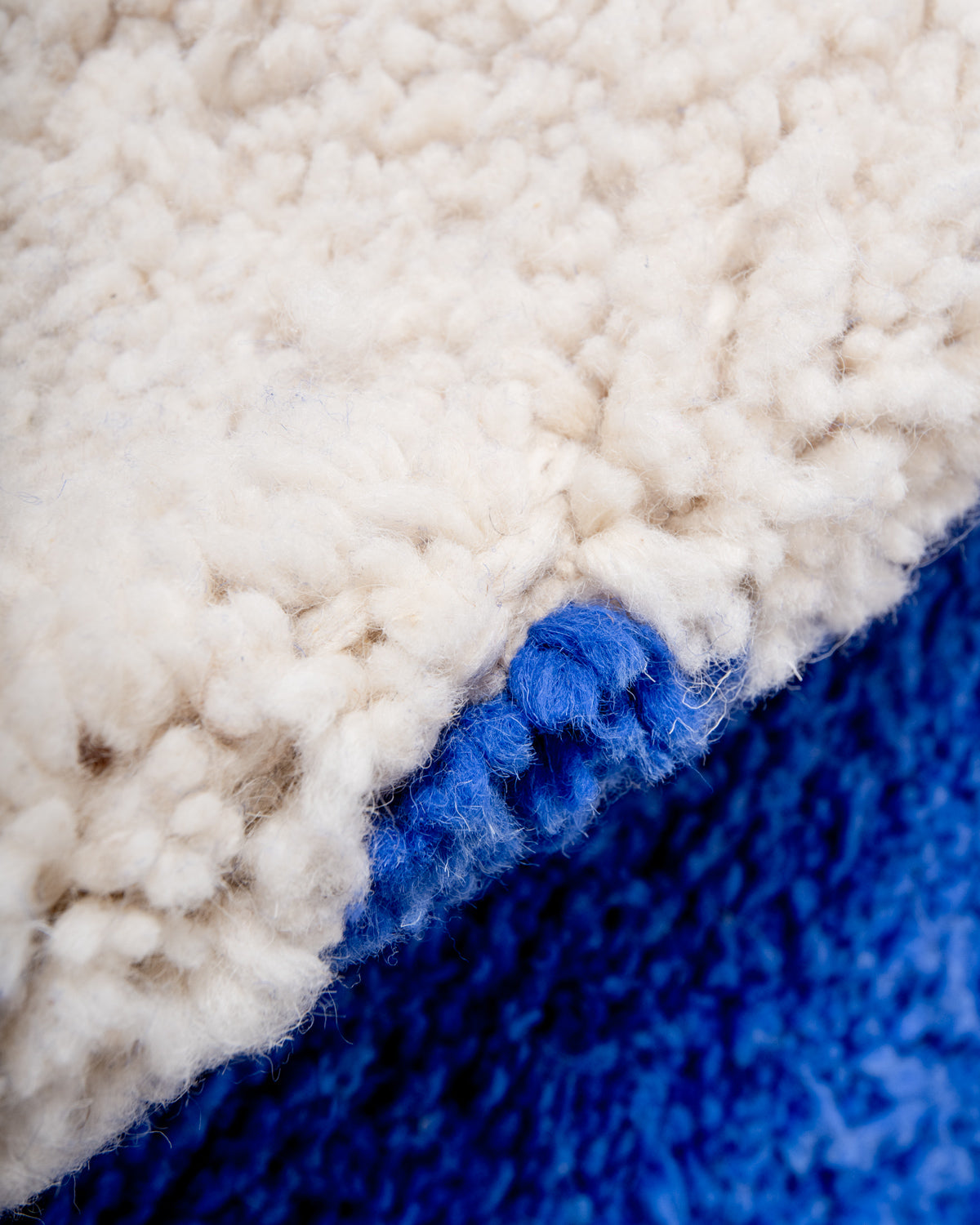 Modern, designer, handcrafted Berber rug from Morocco. Beniourain carpet with beautiful colours and patterns and fluffy wool texture.